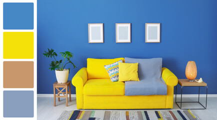 Aufkleber - Stylish living room with comfortable yellow sofa near blue color wall. Interior design and matching color palette