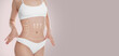 © New Africa - Woman with perfect slim body on dusty pink background, closeup. Figure correction arrows and lines on skin. Banner design with space for text