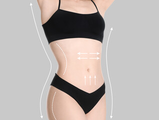 Sticker - Woman with perfect slim body on light grey background, closeup. Figure correction arrows