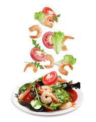 Poster - Shrimps and other ingredients falling onto plate on white background