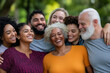 © SnapVault - A diverse group of friends standing together outdoors, smiling and enjoying each other's company.The joy of connection and unity in friendship,set against a backdrop of greenery.Diversity people unity