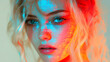 © Siasart Stock - Portrait with colorful light patterns on a woman's face.