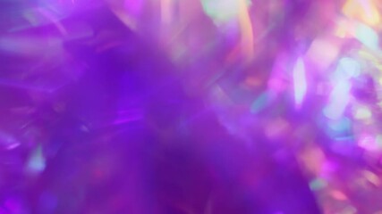 Wall Mural - A holographic rainbow iridescent neon purple pink teal blue colors abstract background