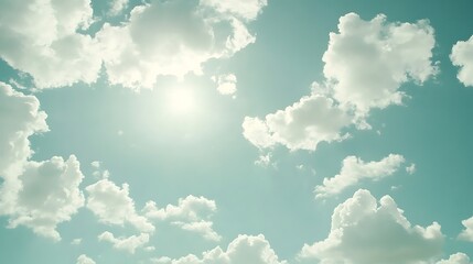Aufkleber - A serene sky with fluffy clouds illuminated by sunlight, creating a tranquil and peaceful atmosphere.