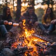 © nakarin - Captivating Campfire Moments Friends Enjoying Marshmallows and Stories in Nature's Embrace
