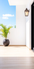 Bright modern balcony with a potted plant and clear skies showcasing a sunny day