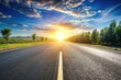 © yuwaree - Empty asphalt road with sunlight background