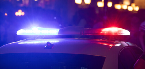 Police car in the city at night.