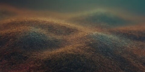 Poster - A close up of a sandy beach with a few small rocks scattered around