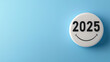© Nattapol - cheerful representation of year 2025, featuring bold black numbers on light blue background, evokes sense of optimism and positivity for future