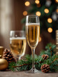 © triocean - Glass of champagne or sparkling wine in the festive Christmas and New Year atmosphere
