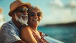 © KarpenArt Studio - A senior couple is seen enjoying their time on a cruise ship, standing on the deck with a beautiful ocean view in the background. Enjoying their retirement and each others company.