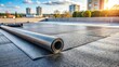 © Atittaya - Heating and melting bitumen roofing felt during flat roof installation