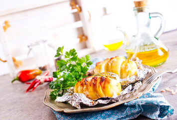 Canvas Print - Baked loaded potato with bacon, cheese and greens