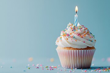 Colorful Cupcake with Candle and Sprinkles