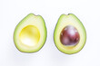 © นางจำนงค์จิตร ทองดี - Two avocados are cut in half. One half is yellow and the other half is green, clean food.