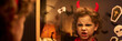 © pressmaster - Long exposure of scary boy in demon costume scowling while standing in front of mirror in home environment on Halloween eve