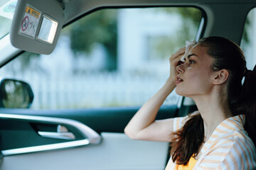 Canvas Print - woman, car, stress relief, mirror, relaxing, emotional expression, casual outfit, summer mood, feeling tired, personal space, day light, urban background, soft colors, slight discomfort, self care