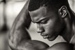 © Vlad - Black Man Stretching - Gym Portrait for Bodybuilder Fitness and Muscle Warm Up