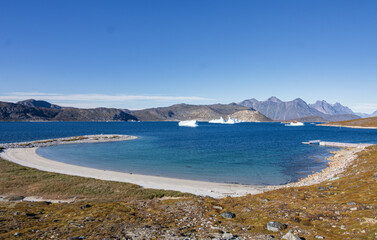 View of montains and icebergs from Uunartoq island (South Greenland)