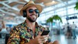 © Pinklife - A cheerful traveler at an airport, wearing headphones and a tropical shirt, exudes relaxation and happiness, ready to embark on a joyous vacation journey.