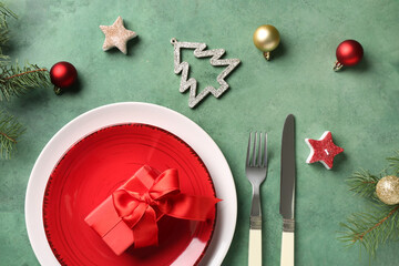 Wall Mural - Beautiful table setting for Christmas dinner on green grunge background