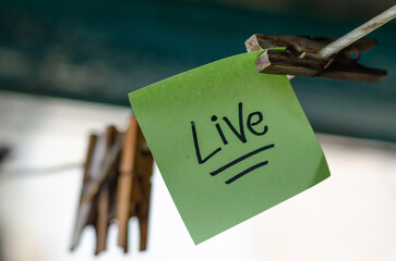 Motivational Word In A Green Square Paper Outdoor Composition