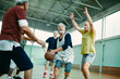 © Geber86 - Seniors playing basketball in an indoor gym