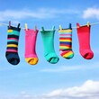© Photo18@desing - A laundry line with colorful socks blowing in the wind, symbolizing fresh, clean fun
