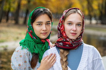 Wall Mural - Russian beauty - young beautiful women in a traditional headscarf