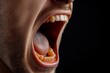 © Sanchai - A close-up of a mouth yelling in anger, showing the raw intensity and power of hatred in their voice