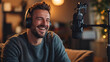 © toodlingstudio - Joyful connection a man engaging in laughter and conversation while podcasting in a cozy setting