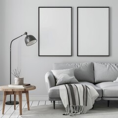 Minimalist living room interior with two blank picture frames, grey couch, wooden coffee table, floor lamp, and white walls. Perfect for showcasing artwork or photographs.