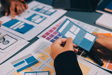The designer team is designing the uxui system to make the uxui system work well on new phones and support system updates. Website development concept UI UX front end designer