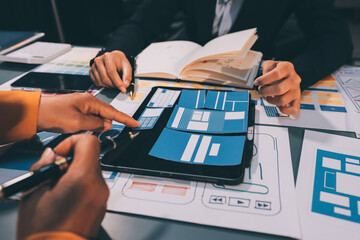 The designer team is designing the uxui system to make the uxui system work well on new phones and support system updates. Website development concept UI UX front end designer