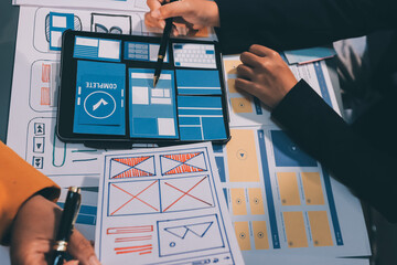 The designer team is designing the uxui system to make the uxui system work well on new phones and support system updates. Website development concept UI UX front end designer