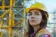 © darshika - Portrait of confident young woman architect at construction site.
