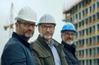 © darshika - Portrait of three architects wearing hardhats