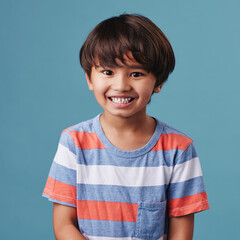 Japanese kid, boy and satisfied in studio background for fashion with fun, outfit and swag in Japan. Male person, child and smile or happy on portrait in confidence with trendy clothes and style