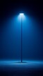 © Hryhor Denys - A single streetlamp stands tall in the mist, casting a calming blue glow that barely penetrates the surrounding fog in a quiet urban setting