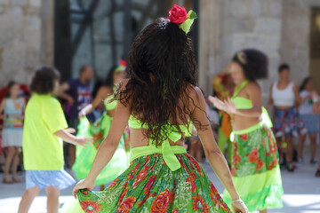 Wall Mural - Dancers dancing and wearing one of the traditional folk costume from Brazil