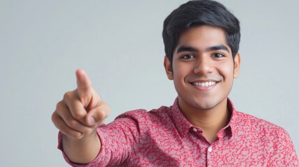 Wall Mural - A person wearing a bright red shirt and giving a thumbs up, possibly indicating approval or agreement