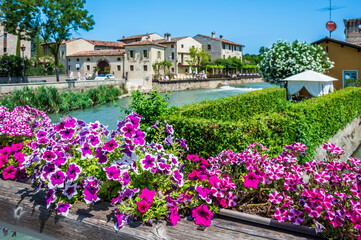 Wall Mural - Summer on the Mincio river. Historic village of Borghetto sul Mincio