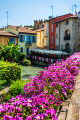 Wall Mural - Summer on the Mincio river. Historic village of Borghetto sul Mincio