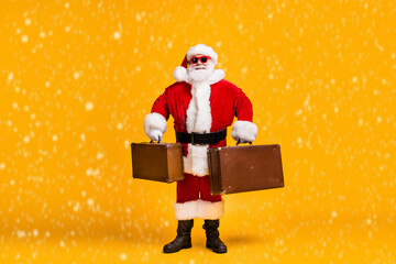 Wall Mural - full length photo of santa claus with beard x-mas christmas eve travel rest hold luggage wear red he