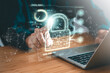 © Kitinut - Data Security system concept, Business man use laptop with security icon screen, innovation technology, cloud computing, internet network communication