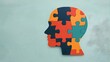 © Srinard - Conceptual of a human head made up of colorful puzzle pieces symbolizing the importance of mental health awareness and wellness  Created using generative technology for World Mental Health Day