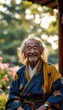 © Laurent Droz - Le vieux sage japonais sourit doucement, ses yeux pétillants de sagesse et de vie. Dans la beauté simple du moment, il trouve une joie pure, savourant chaque seconde avec gratitude.