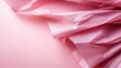 © Maximages  - An abstract display of crumpled pink tissue paper creates a delicate yet artistic visual, displaying layers and textures in soft pink hues.