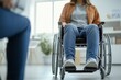 © CreativeLight - A scene depicting a person in a wheelchair attending a therapy session with a psychologist or psychiatrist, highlighting the supportive environment for individuals with special needs